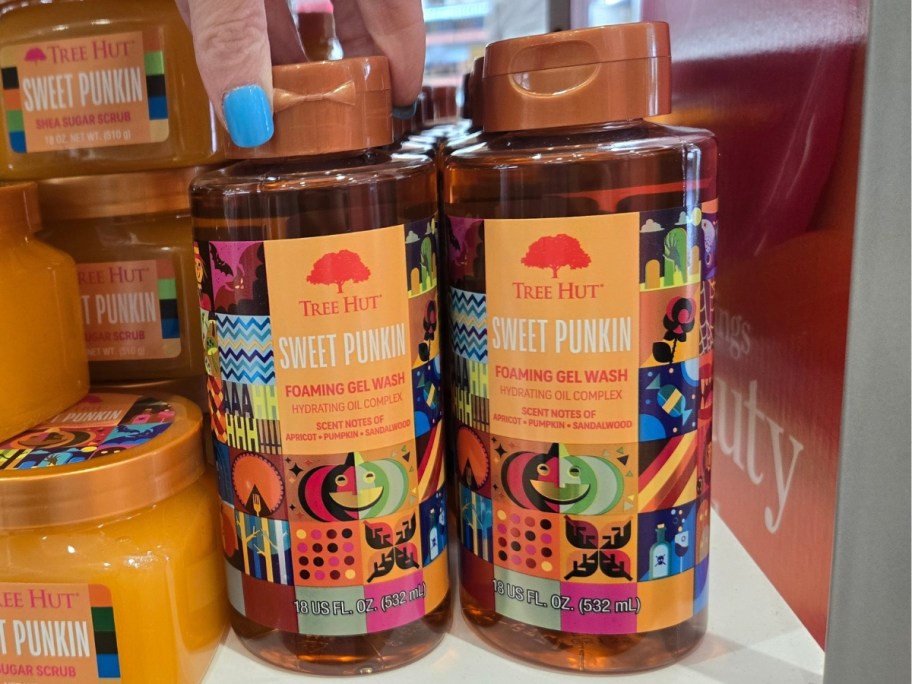 two bottles of tree hut sweet pumkin body wash on a store shelf