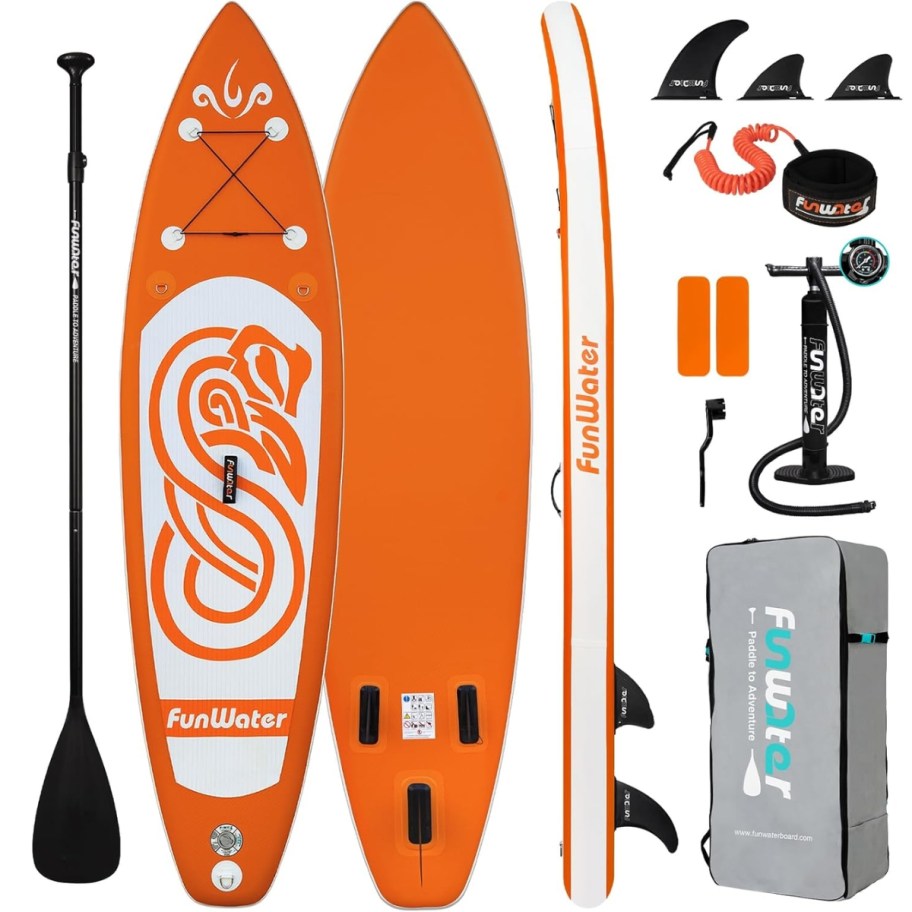 an orange and white inflatable paddle board with accessories