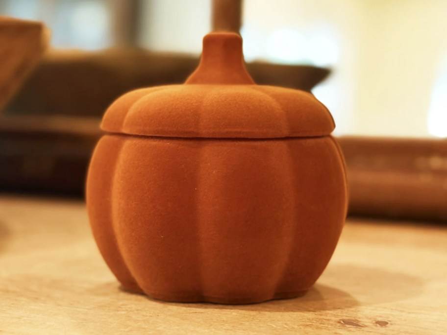 orange flocked pumpkin shaped candle