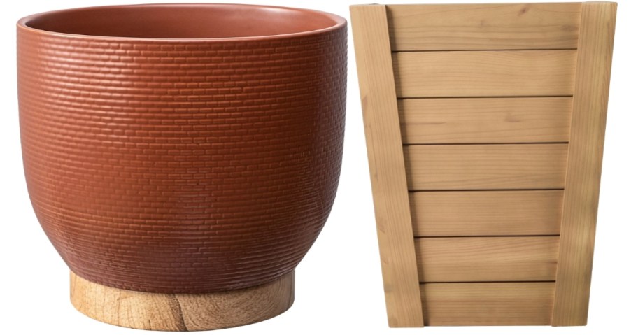 a red ceramic planter with a natural colored wood one