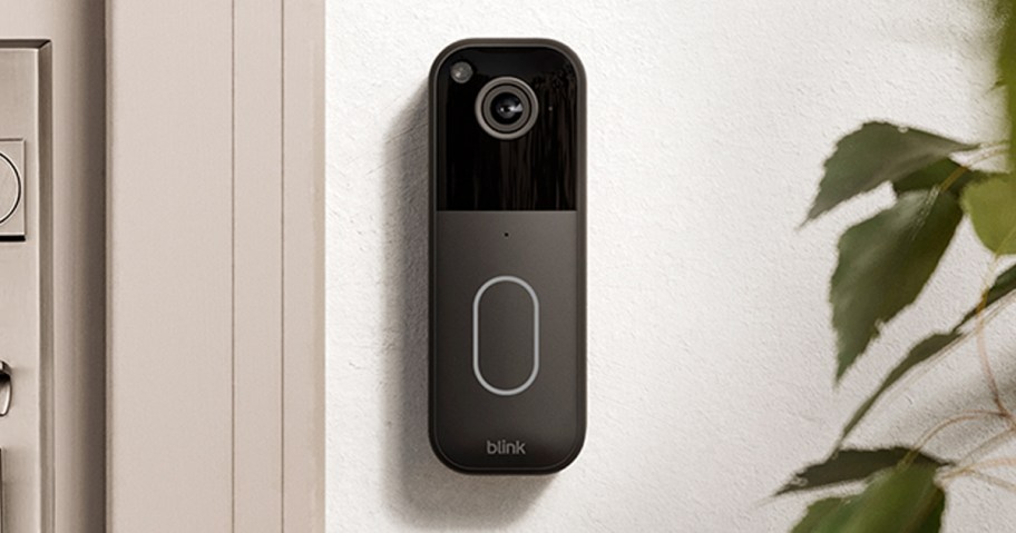 black video doorbell near door