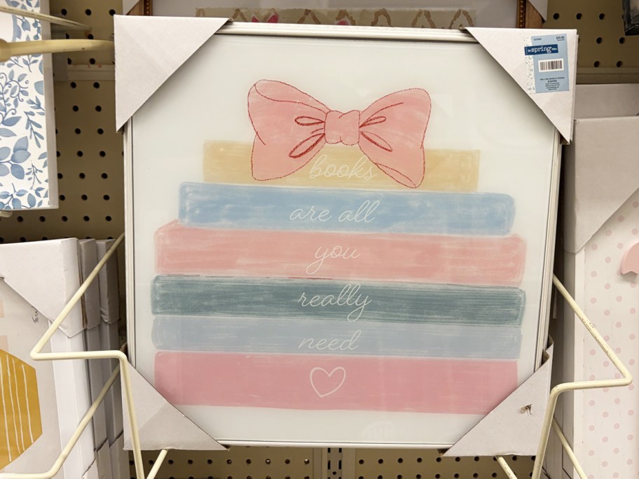 Books Are All You Need Framed Wall Decor on store display wall