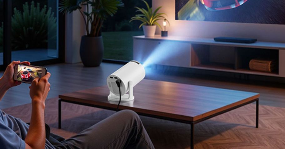 Mini Portable Projector on table in living room