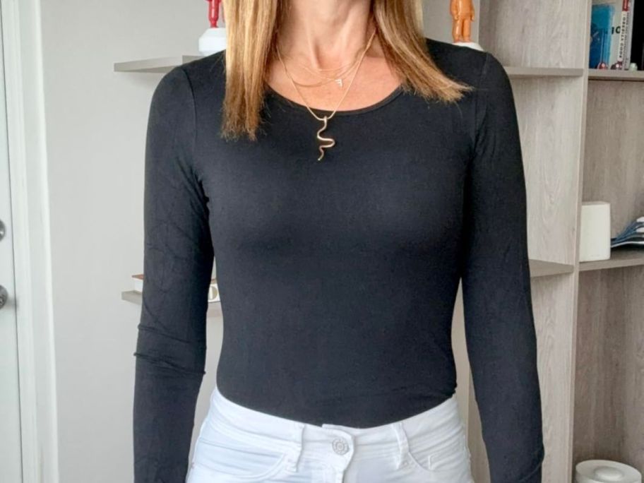 A woman wearing a black shirt