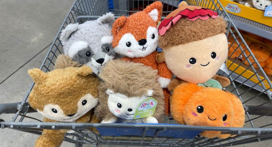 multiple fall plush inside of the walmart shopping cart