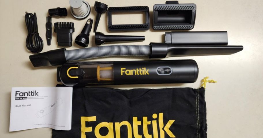 Fanttik Slim Portable V8 APEX Mini Car Vacuum and accessories on counter