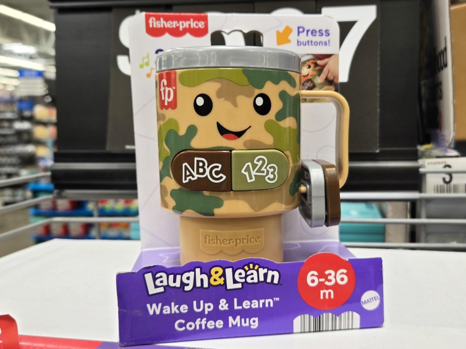 Fisher-Price Laugh & Learn Camo Coffee Cup on shelf in store