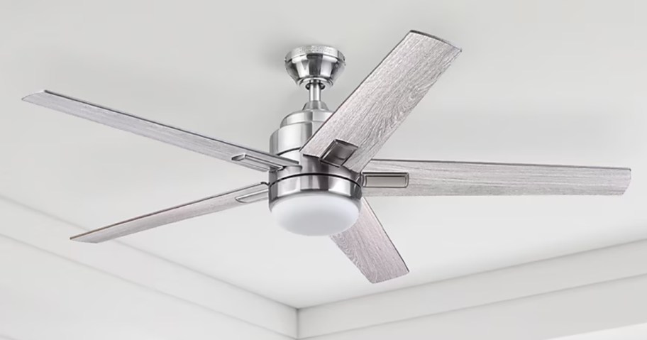 a grey and silver ceiling fan