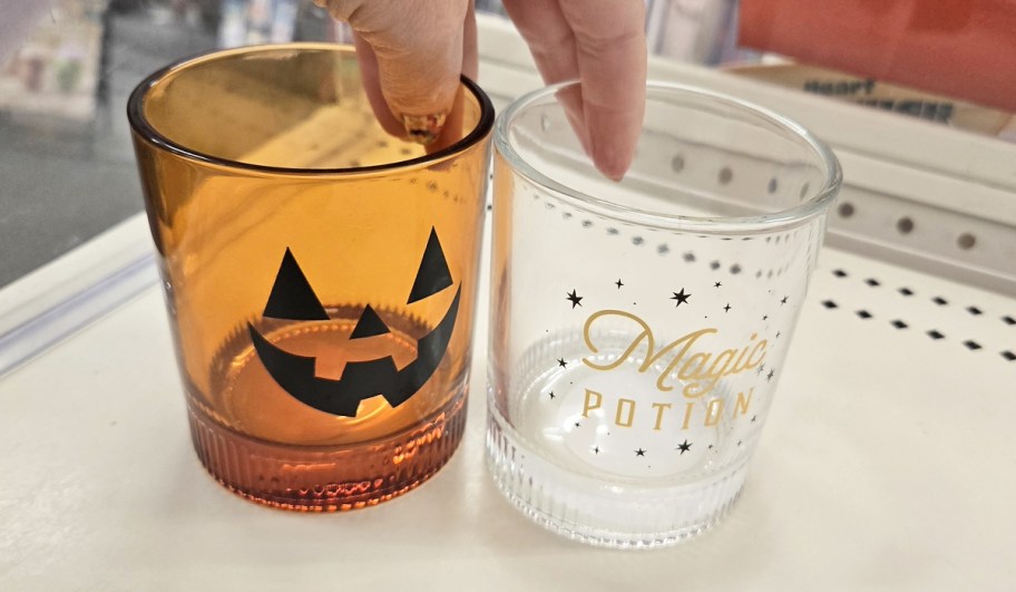 glasses with a jack-o-lantern face and one that says "magic potion"