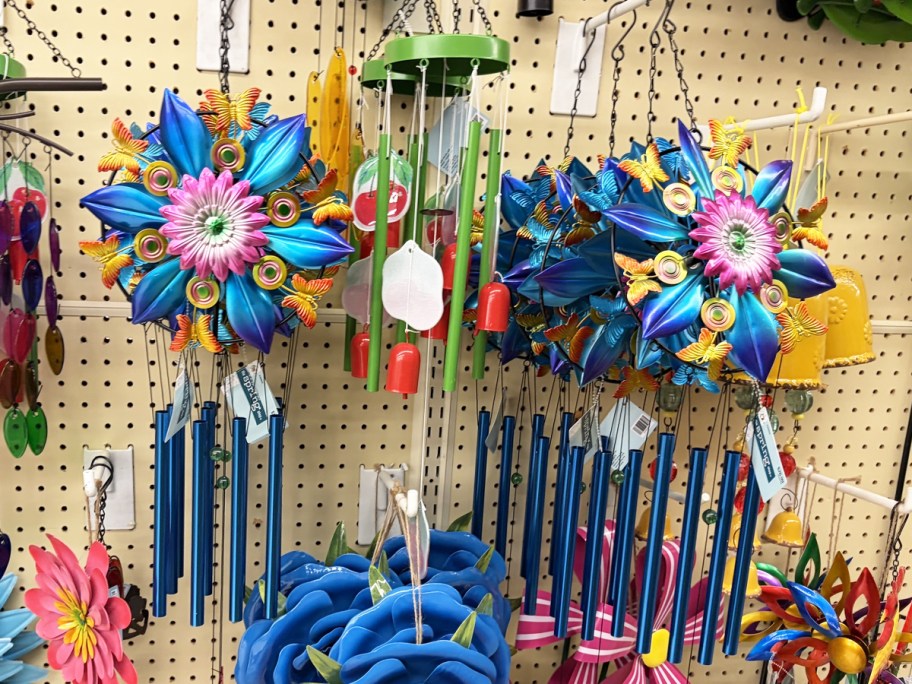 colorful wind chimes on store display wall
