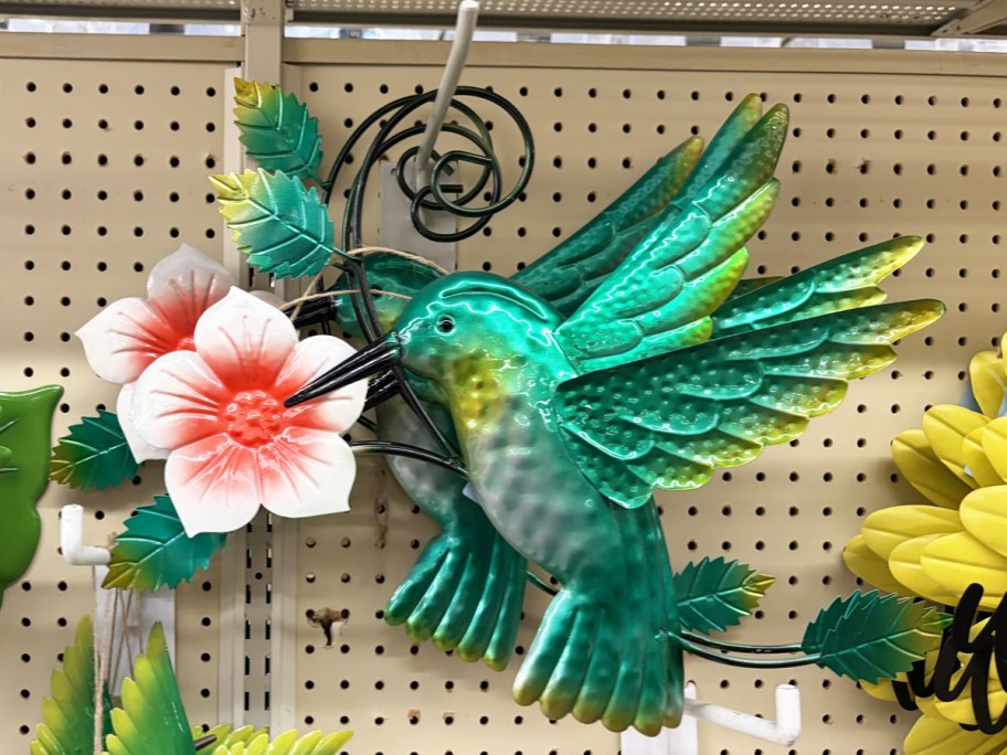 green Hummingbird Metal Wall Decor on store display wall