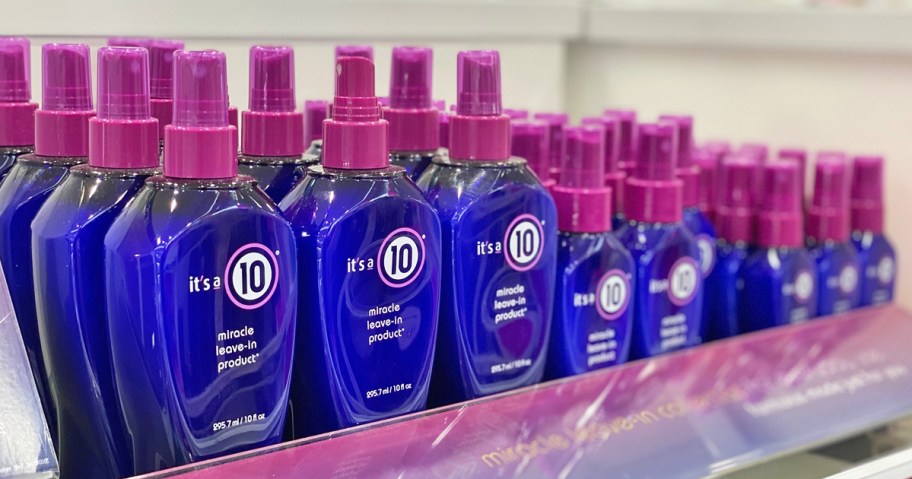 blue and purple bottles of It's a 10 Miracle Leave In Conditioner on store shelf
