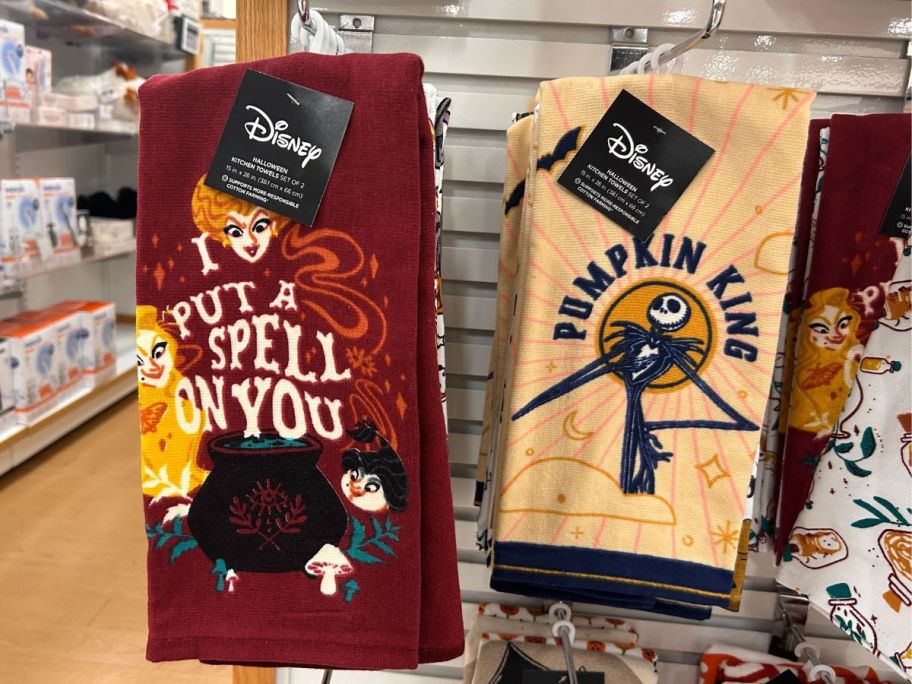 Several kitchen towel sets in Halloween themed Disney styles