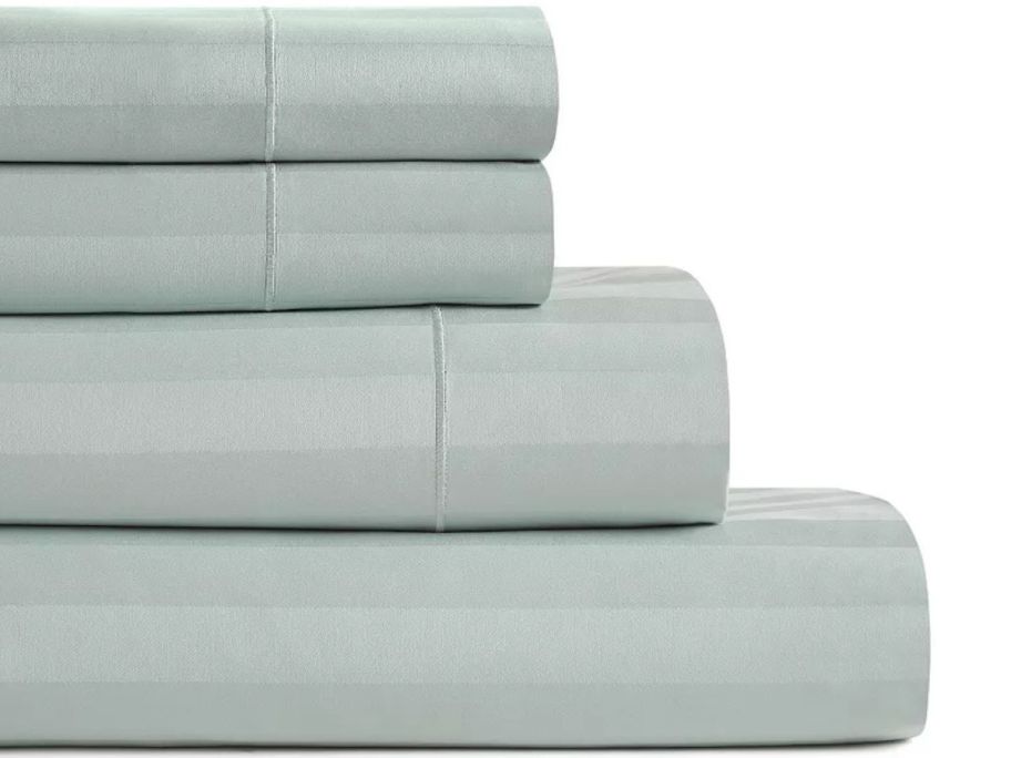 A stacks ofHotelier Egyptian Cotton Blend Stripe Sheets