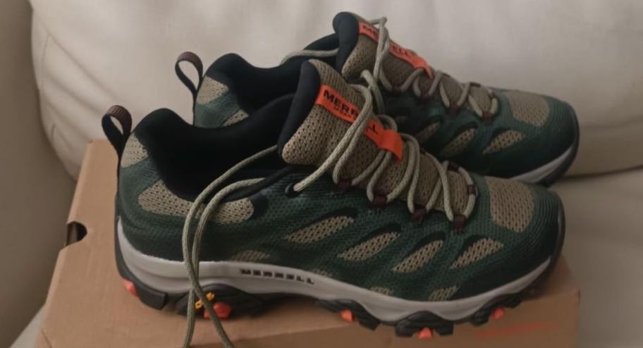 Merrell shoes on top of a box 