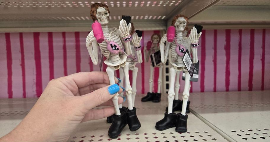 Skeleton figurines with a water bottle