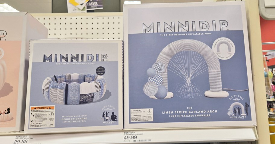 inflatable pool and sprinkler arch on store shelf