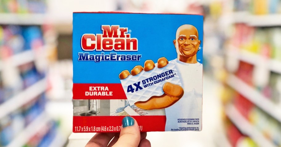 hand holding a box of Mr. Clean Extra Durable Magic Erasers in store