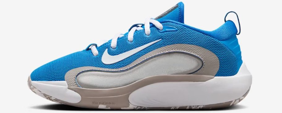 Stock image of a blue and gray Nike IsoFly Big Kids Basketball Shoe