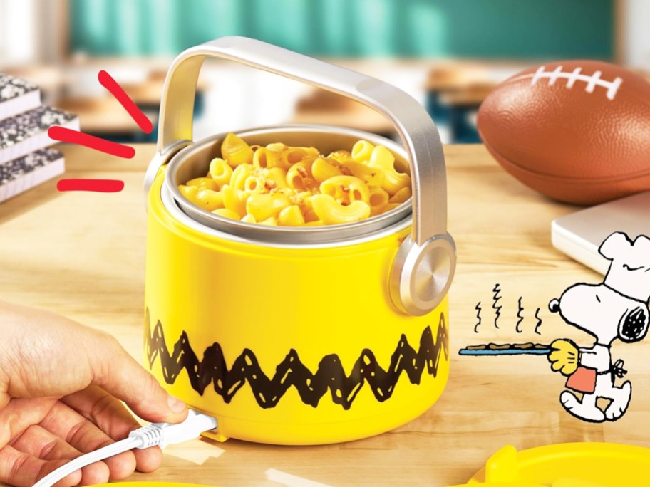 yellow charlie brown themed heated lunch box pot