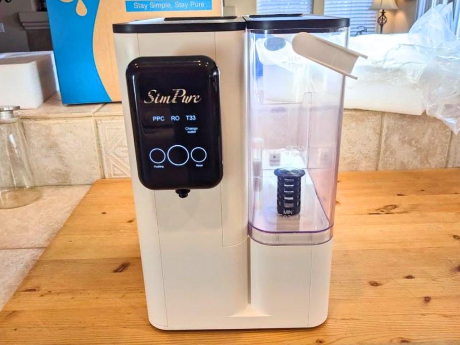 a water purifier on a kitchen counter