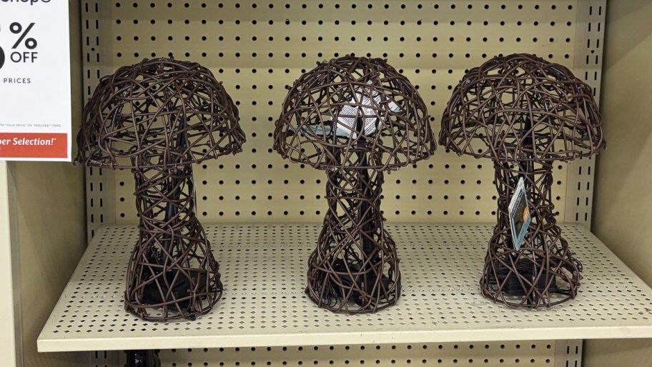 brown rattan mushroom lights on store shelf