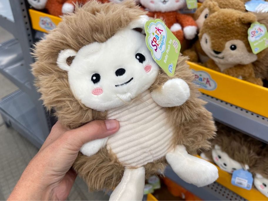 hand holding Spark.Create.Imagine Hedgehog Plush Toy at the store