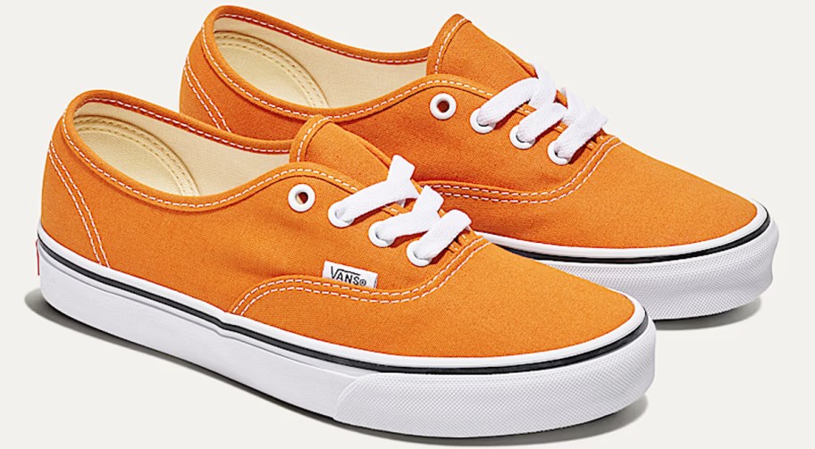 pair of orange sneakers