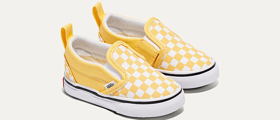 yellow and white checkerboard print sneakers