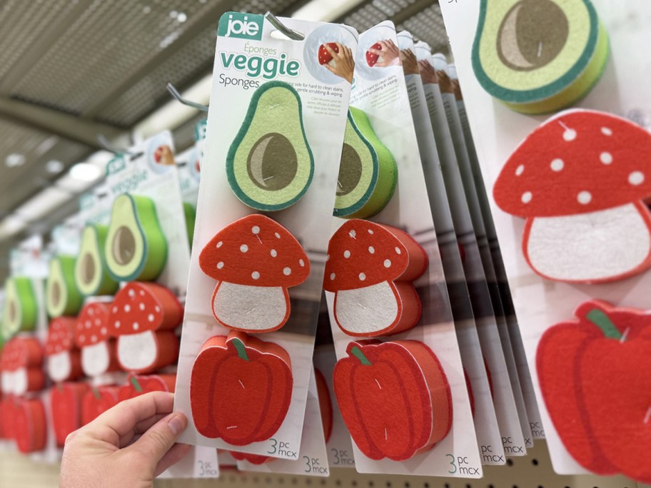hand grabbing a set of vegetable print sponges