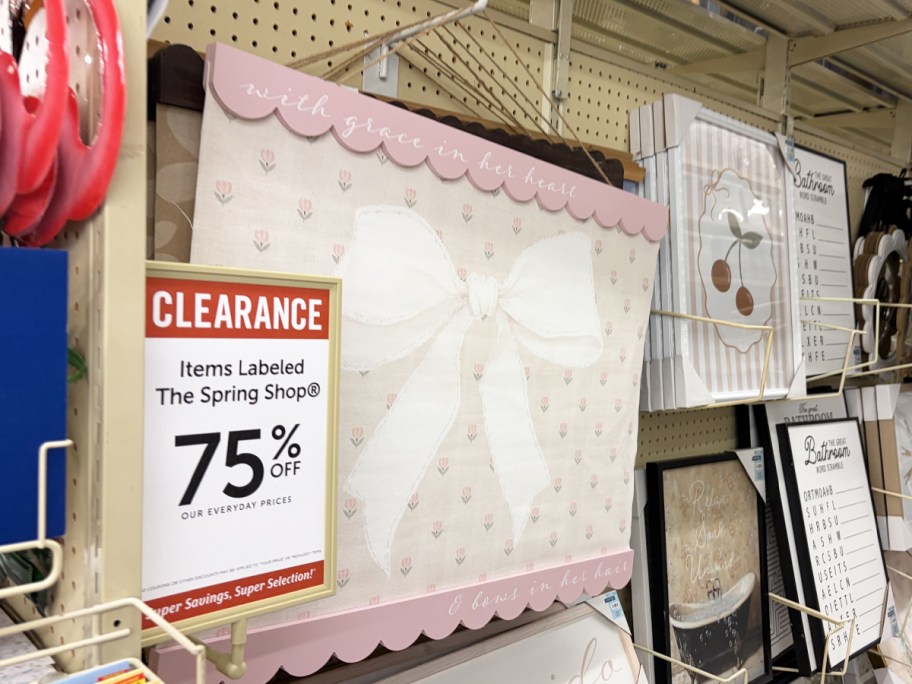 pink bow wall tapestry in display in store