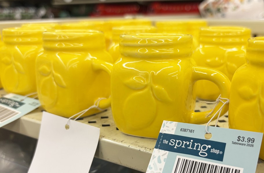 mini yellow lemon mugs on store shelf