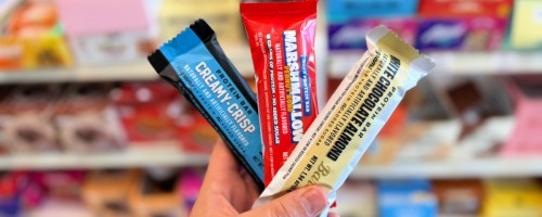 barebells protein bars in hand