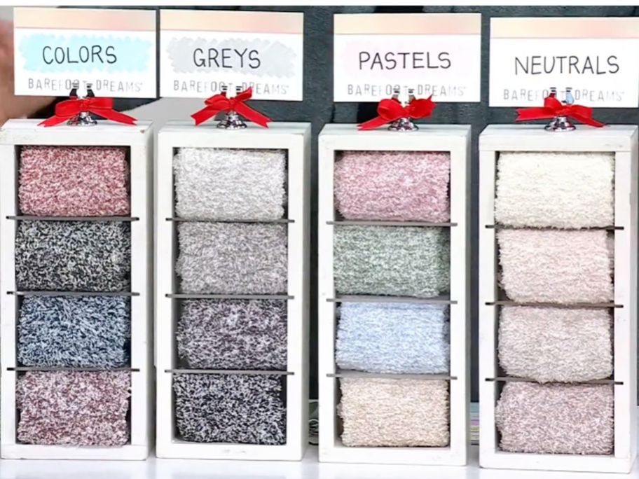 four different packs of barefoot dream socks on display