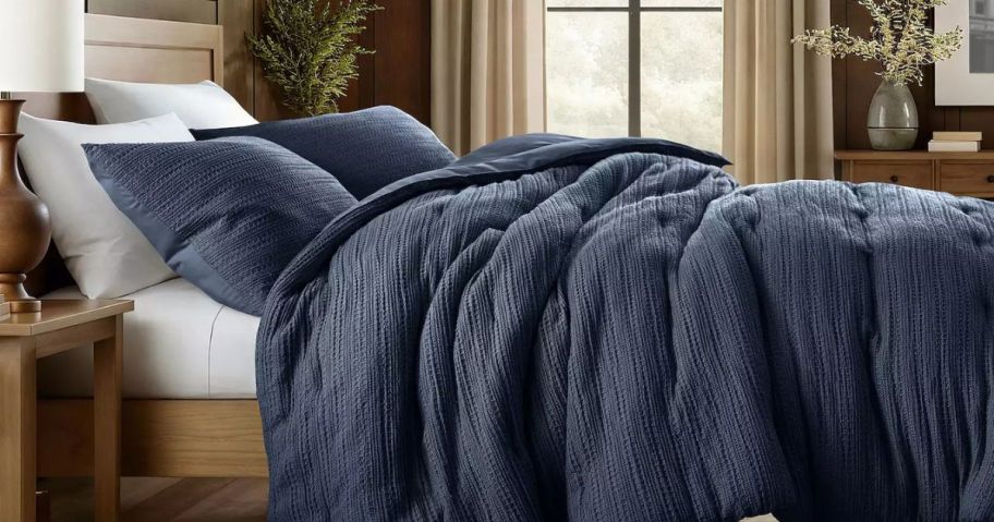 comforter and shams on bed