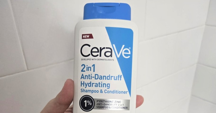 CeraVe Anti Dandruff Shampoo & Conditioner bottle in hand