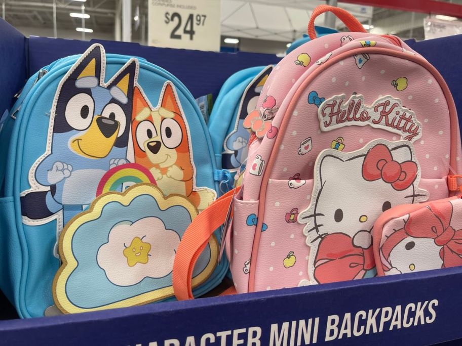 character mini backpacks in bluey and hello kitty displayed at the store