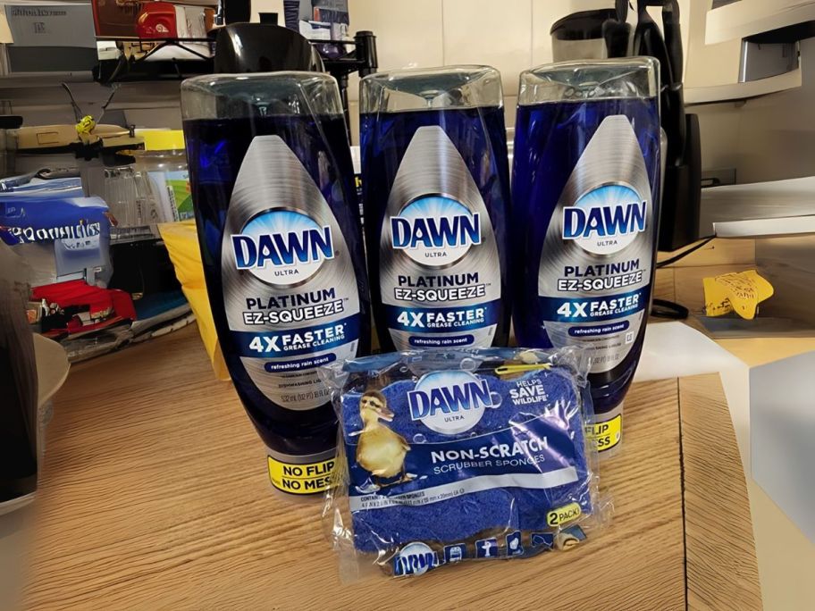 three ez-squeeze dawn dish soaps and a 2 sponge pack on counter