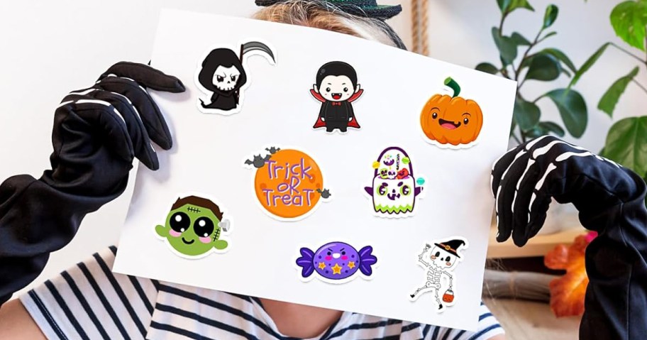 person holding a sheet on Halloween stickers