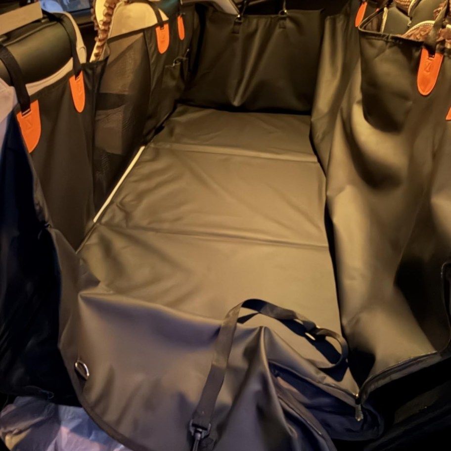 seat cover and extender in the back seat of an SUV