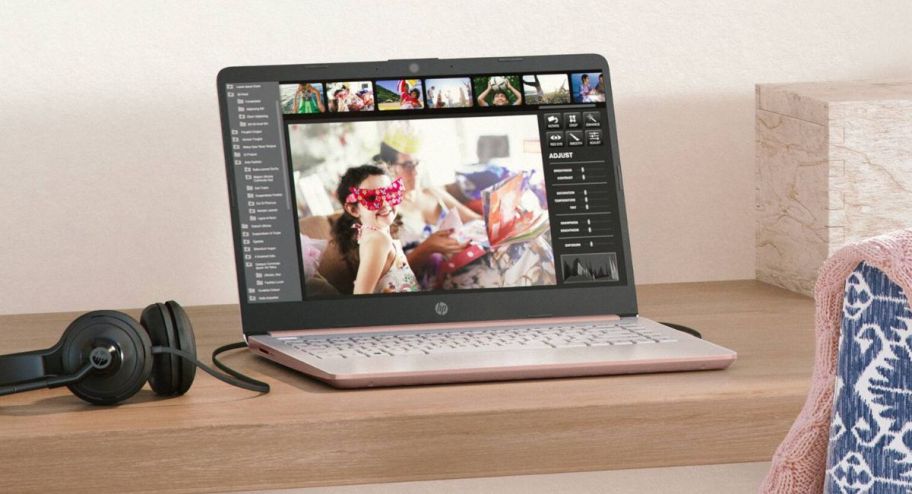 hp laptop pink on top of the table