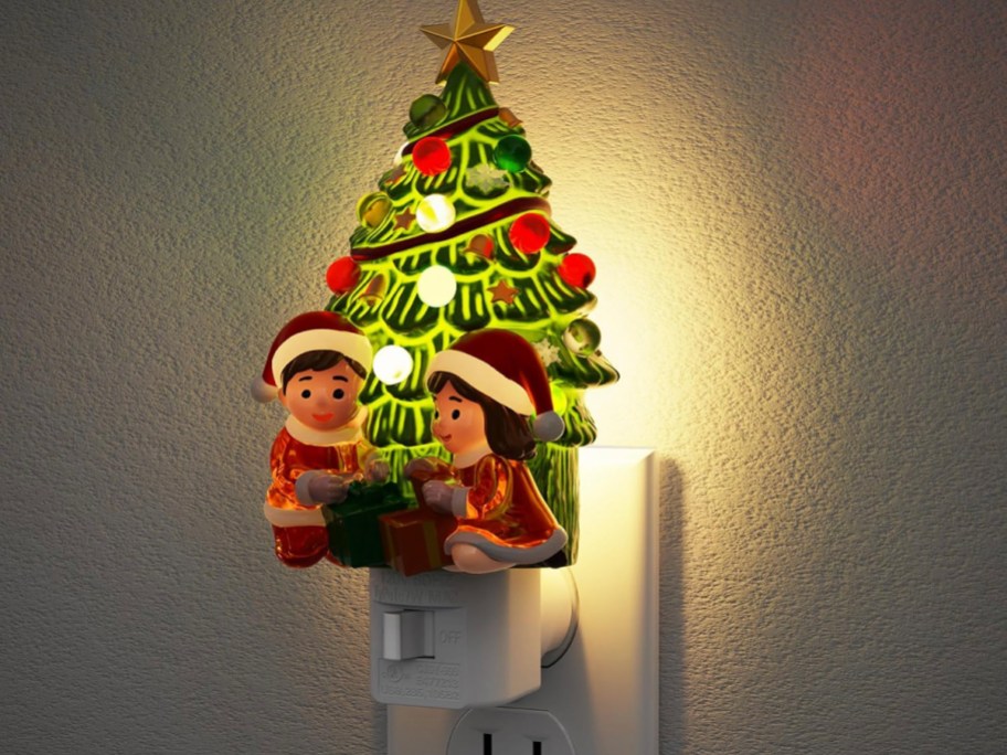 santa christmas night light plugged in on wall