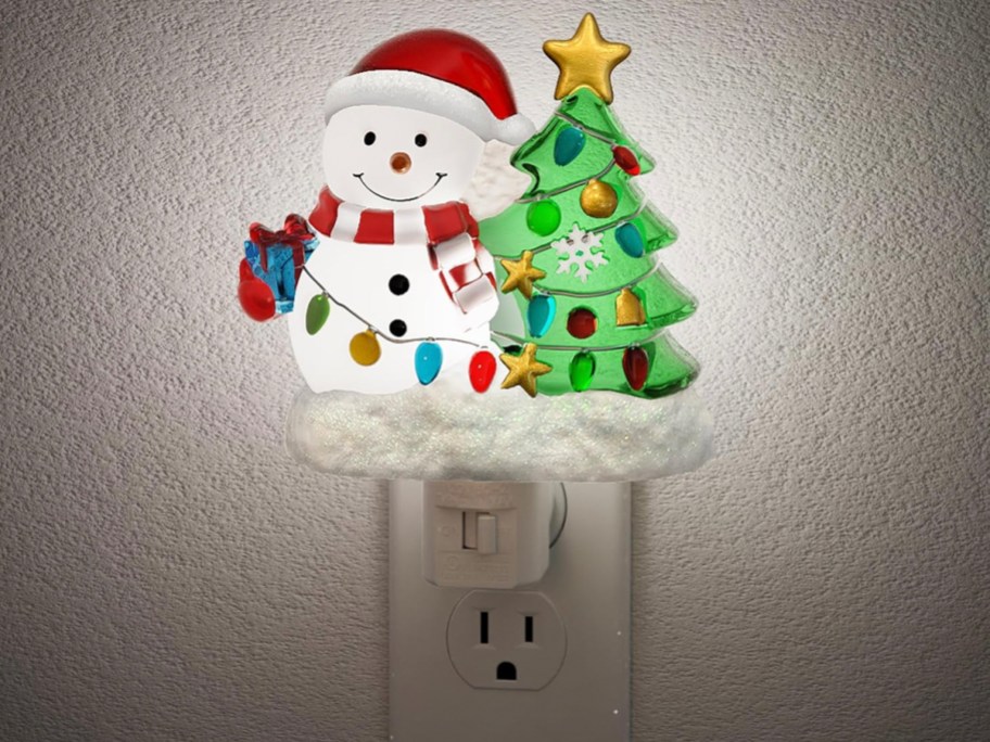 Snowman Night Light in outlet on wall