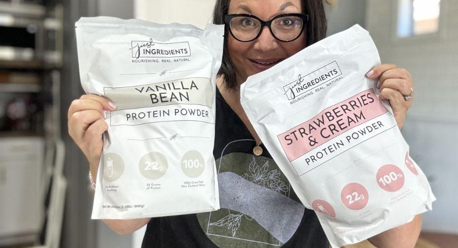 woman holding two just one ingredient protein shake bags