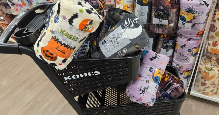 Peanuts and Disney Fall and Halloween Throw Blankets in a Kohl's shopping cart