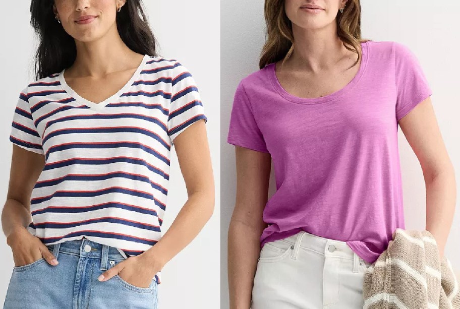 Two women are side by side, one wearing a striped V-neck T-shirt and jeans, the other in a solid pink T-shirt and white pants, holding a knit blanket.