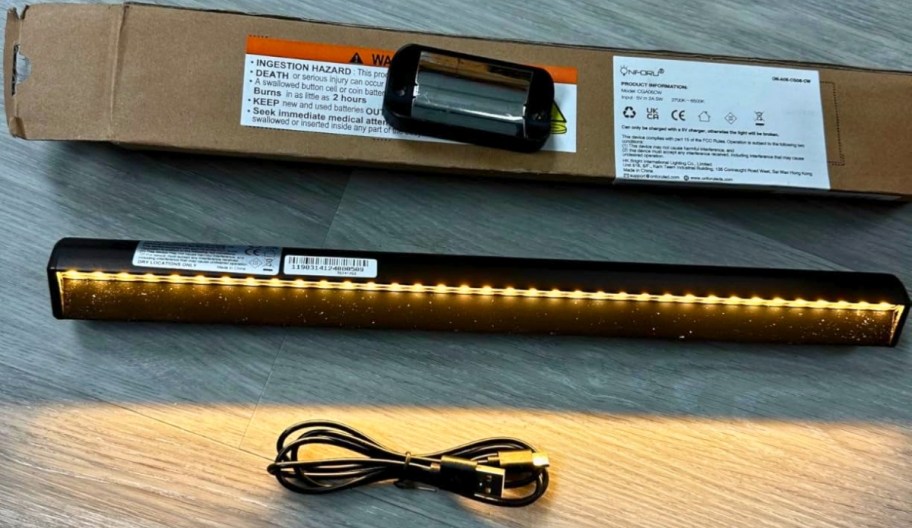 magntic light bar shown with charging cord and mounting bracket