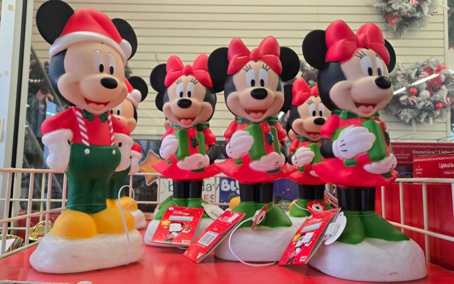 two different mickey and minnie blow molds