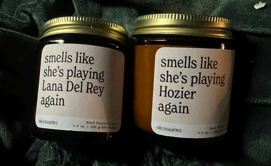 music custom candles in amber jars on blanket