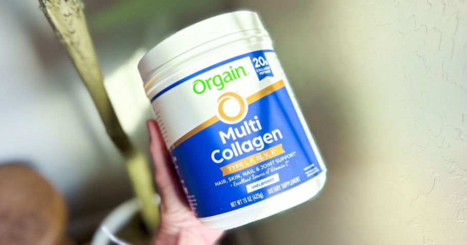 Orgain Hydrolyzed Multi Collagen Powder 15oz tub in hand